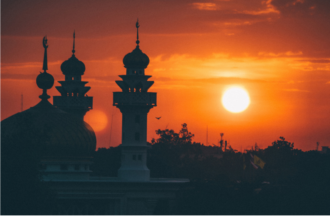 Sunset behind a mosque